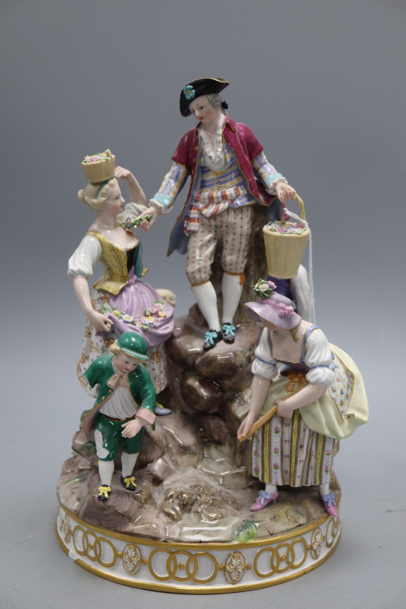 A 19th century Meissen gardening group, height 29cm, model D97